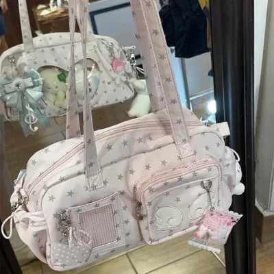 Sac à bandoulière rose souple pour femme
